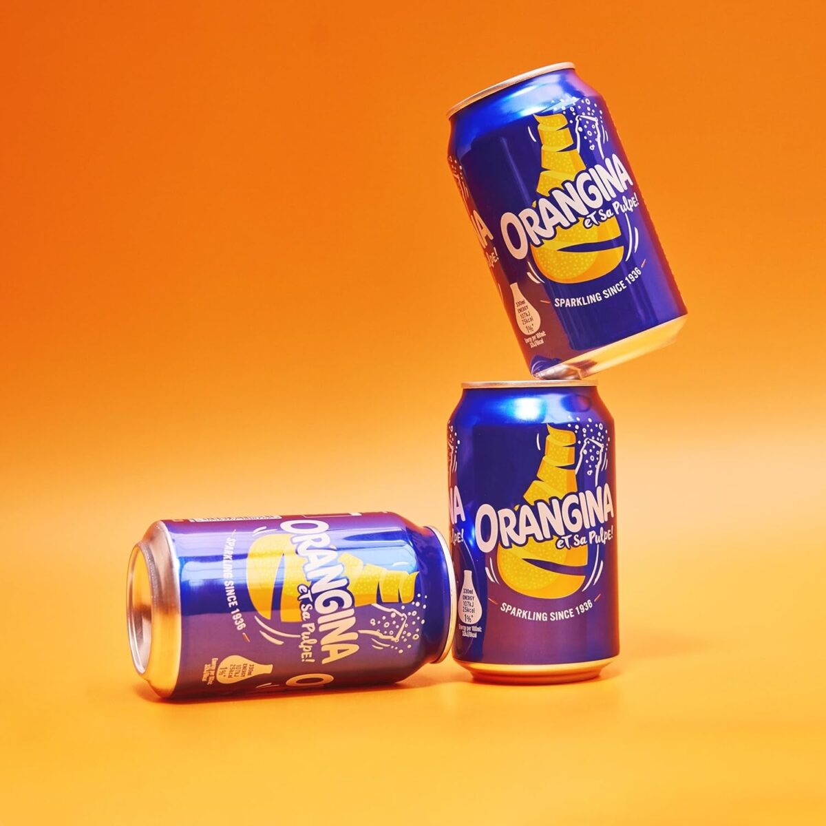 Orangina Sparkling Fruit Drink; Multipack of 6 X 330Ml Cans; Contains a Blend of Citrus Juices, Real Orange Pulp and Orange Zest
